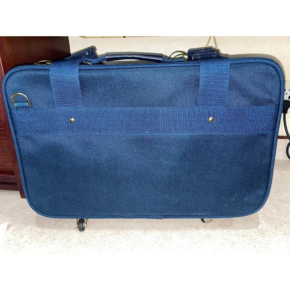 Vintage Valoroso Navy Rolling Suitcase with Brass Hardware – Classic Pilot Style